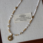 Natural Shell Bead Necklace with Sun Pendant Titanium Steel