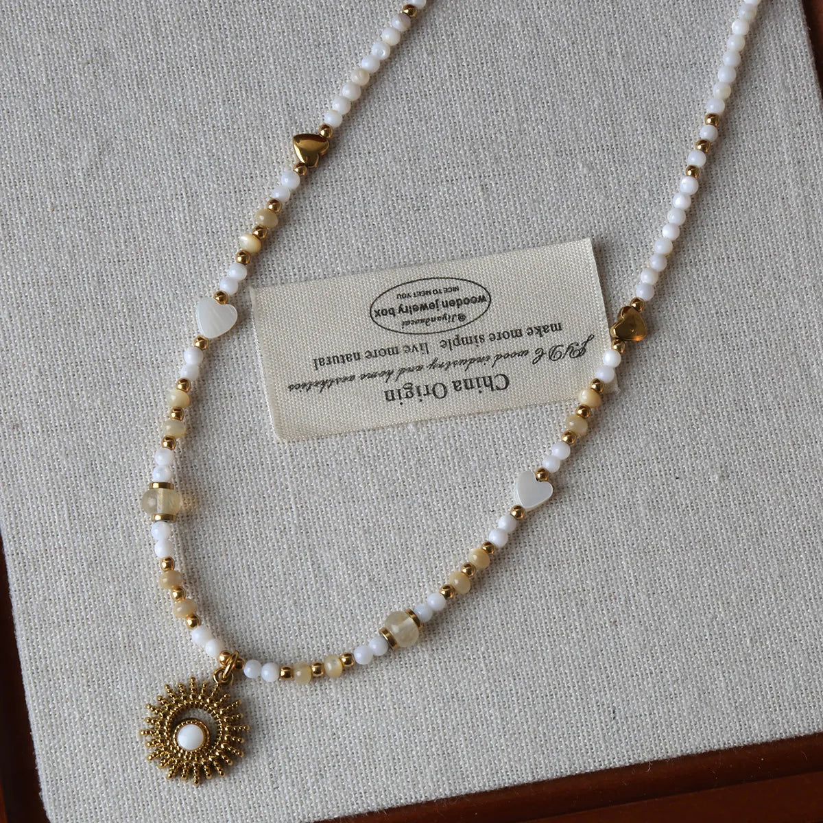 Natural Shell Bead Necklace with Sun Pendant Titanium Steel